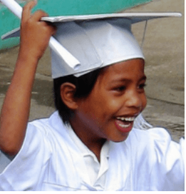 Daniel graduating from Kindergarten - the school in a cart - 2014