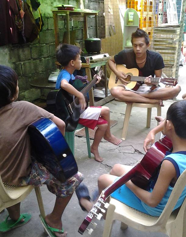 Music in a Cart first guitar lessons March 2015