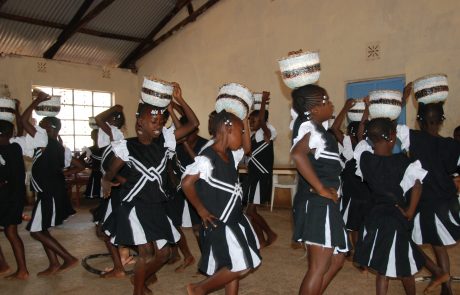 Students dancing and singing at graduation for the co-op